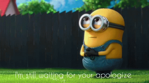 A Picture Of A Minion With The Words I 'M Still Waiting For Your Apologize GIF
