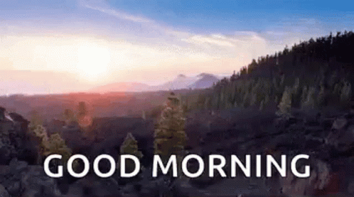 A Picture Of A Mountain Landscape With The Words `` Good Morning '' Written On It . GIF