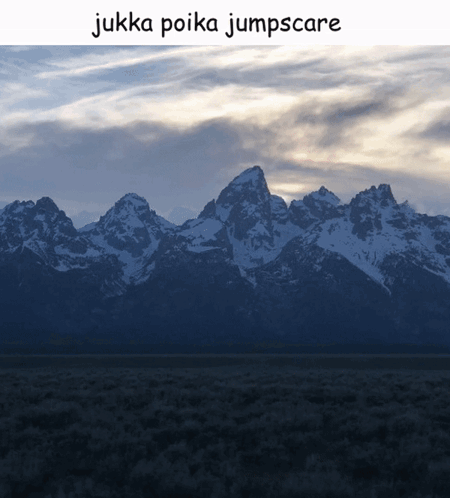 A Picture Of A Mountain Range With The Words " Jukka Poika Jumpscare " Below It GIF