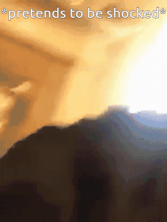 A Picture Of A Mountain With The Words Pretends To Be Shocked Above It GIF