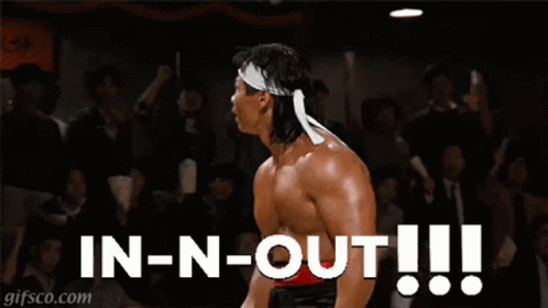 A Picture Of A Muscular Man With The Words In-N-Out Written Below Him GIF