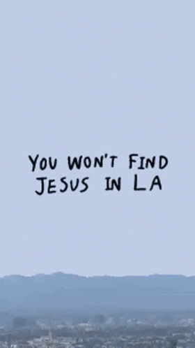 A Picture Of A Palm Tree With The Words `` You Won 'T Find Jesus In La '' Written On It . GIF