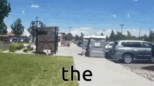 A Picture Of A Parking Lot With The Word The At The Bottom GIF