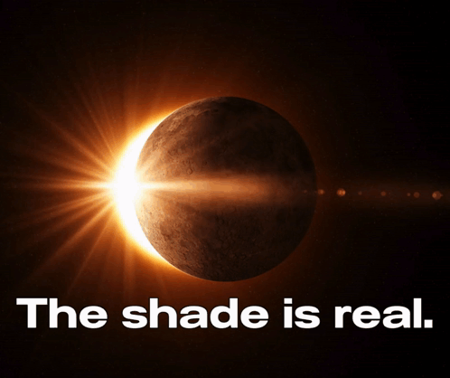 A Picture Of A Partial Eclipse With The Words " The Shade Is Real " Below It GIF