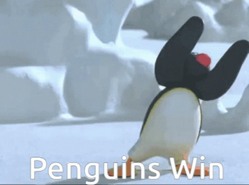 A Picture Of A Penguin With The Words " Penguins Win " On The Bottom GIF