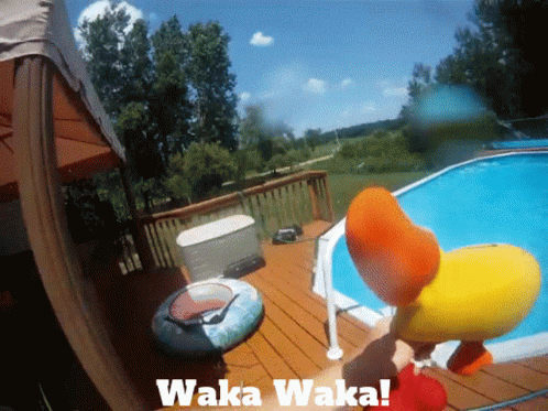 a picture of a person in a pool with waka waka written on it