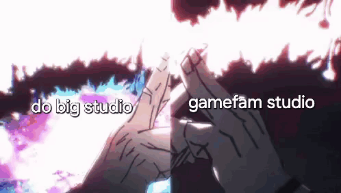 A Picture Of A Person 'S Hands With The Words `` Do Big Studio '' And `` Gamefam Studio '' Written Below Them . GIF