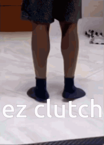 A Picture Of A Person 'S Legs With The Words Ez Clutch Below It GIF