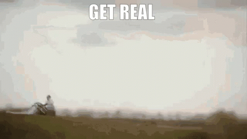 A Picture Of A Person Sitting On A Hill With The Words Get Real Written On The Bottom GIF