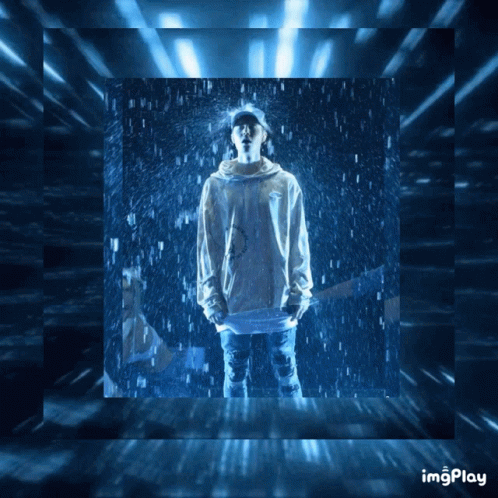 A Picture Of A Person Standing In The Rain With The Words Imgplay Written Below It GIF