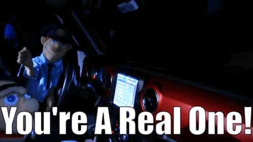 A Picture Of A Puppet In A Car With The Words You 'Re A Real One GIF
