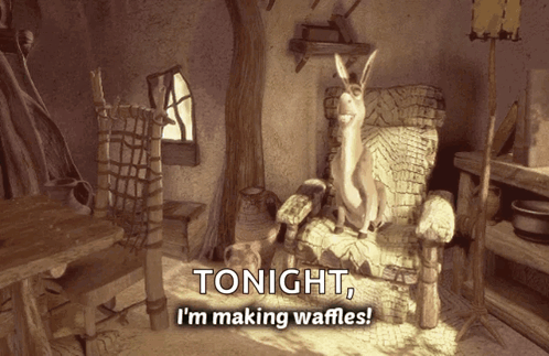 a picture of a rabbit sitting in a chair with the words tonight i 'm making waffles on the bottom