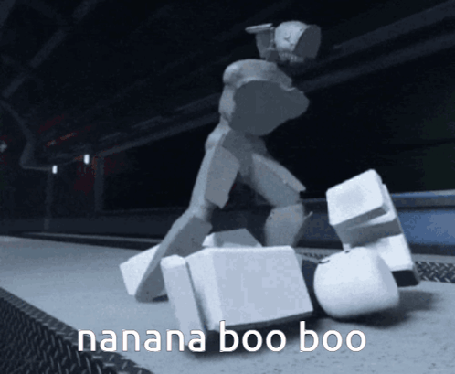 A Picture Of A Robot That Says ' Nana Boo Boo ' GIF