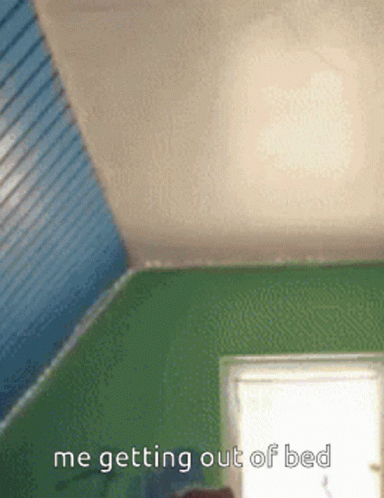 A Picture Of A Room With The Words Me Getting Out Of Bed Written On It GIF