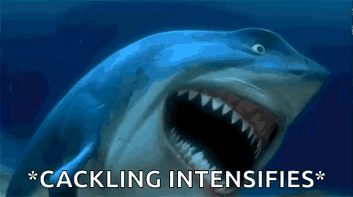 A Picture Of A Shark With Its Mouth Open And The Words " Cackling Intensifies " Below It GIF