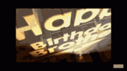 A Picture Of A Sign That Says Happy Birthday On It GIF