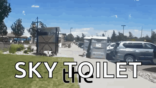 A Picture Of A Sky Toilet With A Van Parked In Front Of It GIF