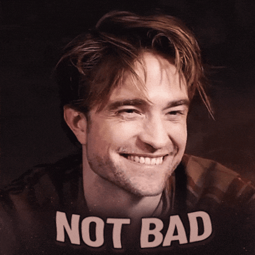 A Picture Of A Smiling Man With The Words Not Bad On The Bottom GIF