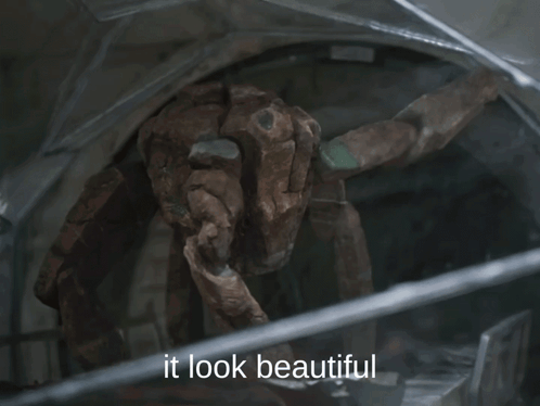 A Picture Of A Statue With The Caption It Look Beautiful GIF