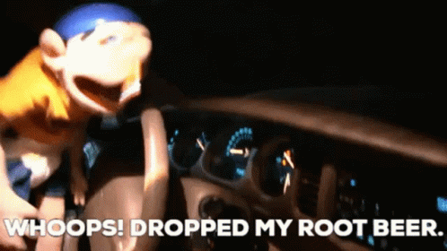 A Picture Of A Stuffed Animal In A Car With The Words Whoops Dropped My Root Beer GIF