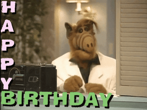 A Picture Of A Stuffed Animal With The Words Happy Birthday Written On It GIF