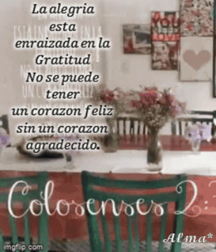 A Picture Of A Table With A Vase Of Flowers And A Quote In Spanish GIF