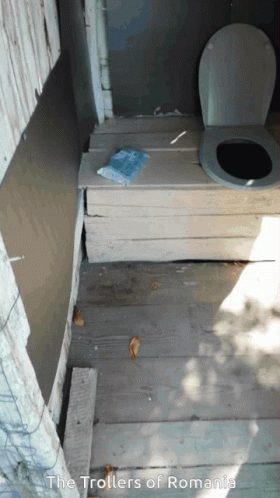 A Picture Of A Toilet With The Words The Trollers Of Romania On The Bottom GIF