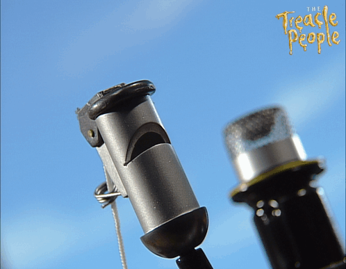 A Picture Of A Whistle And A Microphone With The Words The Treachle People Written On The Bottom GIF