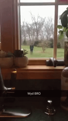 A Picture Of A Window With The Word Wyd Bro On The Bottom GIF