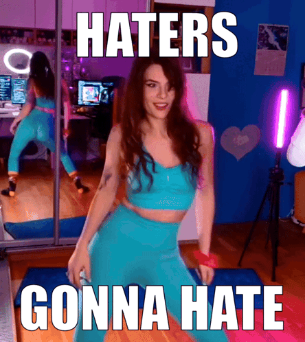 A Picture Of A Woman Dancing With The Words Haters Gonna Hate Above Her GIF