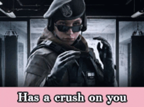A Picture Of A Woman In A Military Uniform With The Words Has A Crush On You GIF