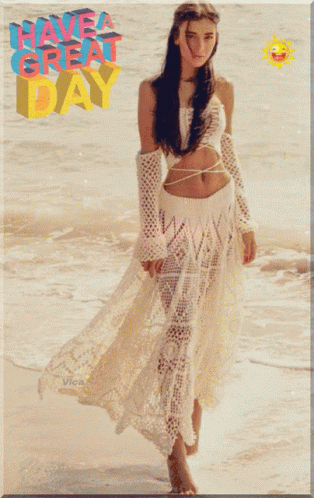 A Picture Of A Woman On The Beach With The Words Have A Great Day Written Above Her GIF