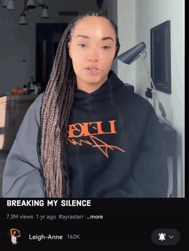 A Picture Of A Woman Wearing A Black Shirt That Says Breaking My Silence GIF