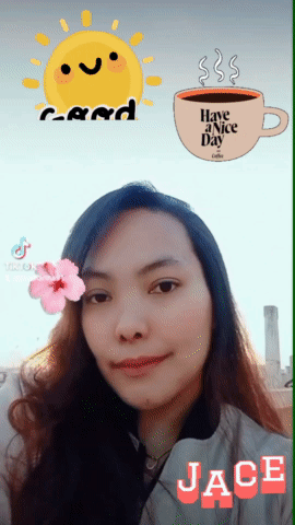 A Picture Of A Woman With A Cup Of Coffee That Says Have A Nice Day On It GIF