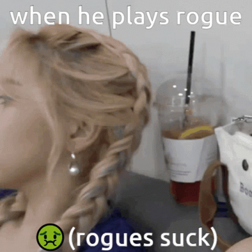A Picture Of A Woman With A Sad Face Next To The Words Rogues Suck GIF
