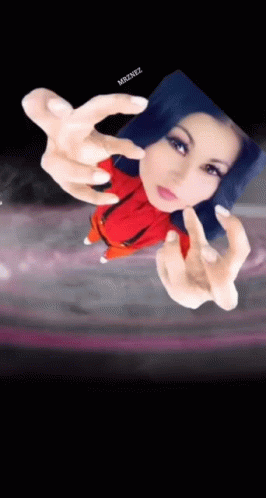 A Picture Of A Woman With Blue Hair And The Name Mr2rez On The Bottom Right GIF