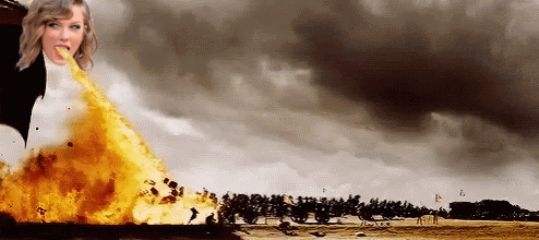 A Picture Of A Woman With Fire Coming Out Of Her Mouth With Trees In The Background GIF