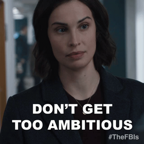 A Picture Of A Woman With The Words " Don 'T Get Too Ambitious " On The Bottom GIF