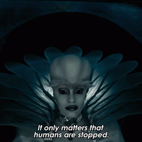 A Picture Of A Woman With The Words " It Only Matters That Humans Are Stopped " Below Her GIF