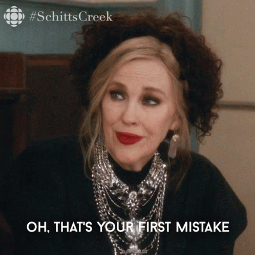A Picture Of A Woman With The Words Oh That 'S Your First Mistake Below Her GIF