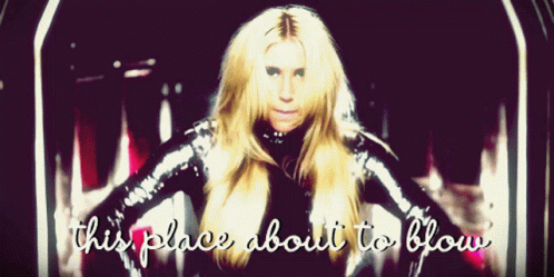 A Picture Of A Woman With The Words " This Place About To Blow " On The Bottom GIF