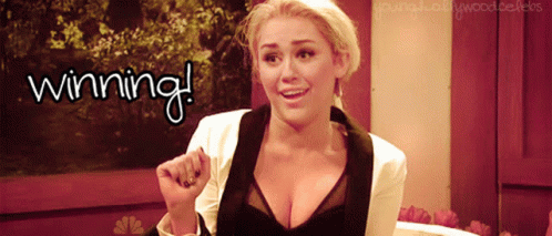 A Picture Of A Woman With The Words Winning Written On It GIF