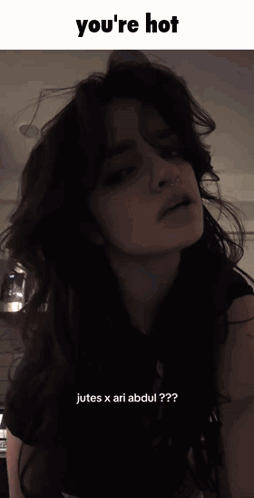 A Picture Of A Woman With The Words You 'Re Hot Jutes X Ari Abdul GIF