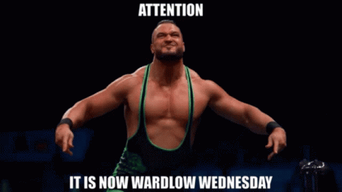 A Picture Of A Wrestler With The Words Attention It Is Now Wardlow Wednesday Below Him GIF