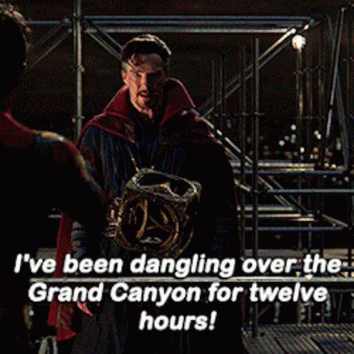 A Picture Of Doctor Strange With A Caption That Says " I 'Ve Been Dangling Over The Grand Canyon For Twelve Hours GIF