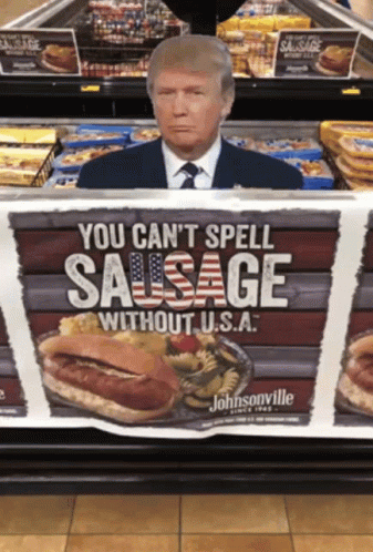 A Picture Of Donald Trump Behind A Sign That Says You Can 'T Spell Sausage Without U.s.a GIF