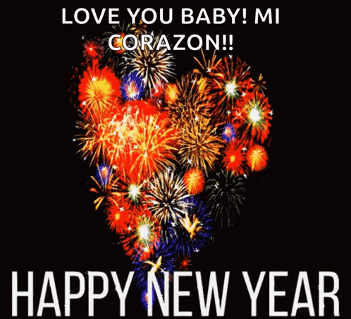 A Picture Of Fireworks In The Shape Of A Heart With The Words Happy New Year GIF