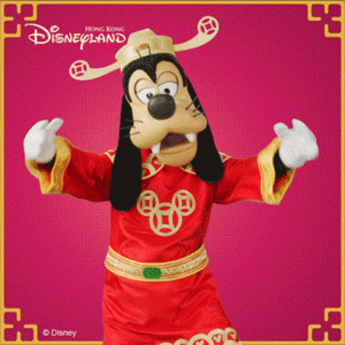 A Picture Of Goofy From Disneyland In A Red And Gold Outfit GIF
