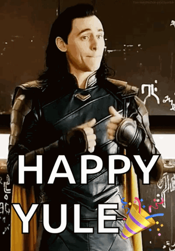 A Picture Of Loki Giving A Thumbs Up With The Words Happy Yule Behind Him GIF