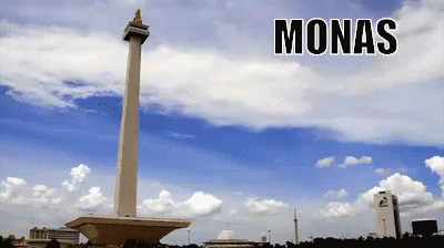 A Picture Of Monas With A Tower In The Foreground GIF